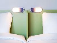 Cama o camas de una habitación en Ibis Budget Braga Centro