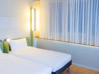 Cama o camas de una habitación en Ibis Budget Braga Centro