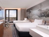 Novotel Christchurch Airportにあるベッド