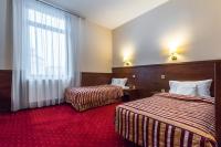 Hotel Poniatowskiにあるベッド