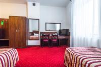 Hotel Poniatowskiにあるベッド