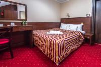 Hotel Poniatowskiにあるベッド