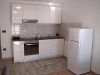 Kuchyňa alebo kuchynka v ubytovaní Apartments DaSara