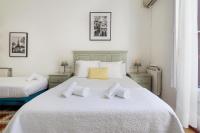 Postel nebo postele na pokoji v ubytování Hostal Girona