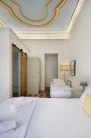 Postel nebo postele na pokoji v ubytování Hostal Girona