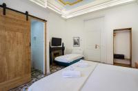 TV a/nebo společenská místnost v ubytování Hostal Girona