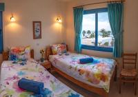 Postel nebo postele na pokoji v ubytování Penthouse direkt am Meer