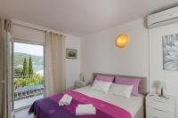 Posteľ alebo postele v izbe v ubytovaní Apartments & Room Eva Slano