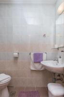 Kúpeľňa v ubytovaní Apartments & Room Eva Slano