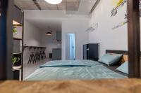 Posteľ alebo postele v izbe v ubytovaní Industrial Apartment ZERO