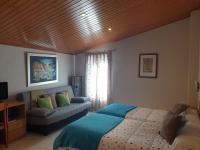 Postel nebo postele na pokoji v ubytování Hostal El Forn