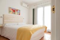 Postel nebo postele na pokoji v ubytování Hotel 3 Arcs