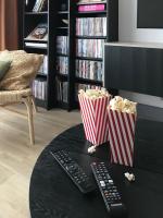A television and/or entertainment centre at Central Point by Zoom Apartments