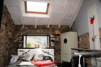 Postel nebo postele na pokoji v ubytování Casas Rurales Entre Babia y La Luna