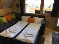 Posteľ alebo postele v izbe v ubytovaní Wooden Apartman Prémium Jacuzzival