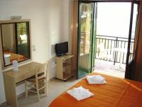 Postel nebo postele na pokoji v ubytování Margarita Beach Hotel