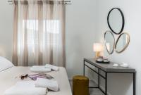 Postel nebo postele na pokoji v ubytování NK Apartments