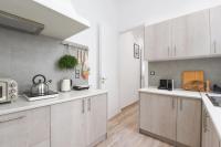 A kitchen or kitchenette at Neoclassical Apartment near Acropolis - LivingStone Crystal