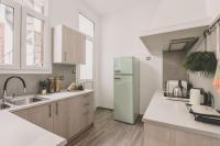 A kitchen or kitchenette at Neoclassical Apartment near Acropolis - LivingStone Crystal