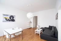 A seating area at easy flat Margareten Apartments