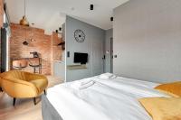 Posteľ alebo postele v izbe v ubytovaní Comfort Apartments Granaria