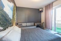 Łóżko lub łóżka w pokoju w obiekcie Hotel Rubino