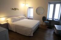A bed or beds in a room at B&B Raponsoli