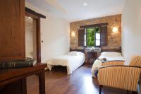 Postel nebo postele na pokoji v ubytování Hotel Rural El Fundil
