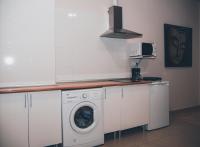 Una cocina o zona de cocina en Apartamentos Centro Emérita