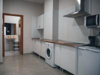 Una cocina o zona de cocina en Apartamentos Centro Emérita