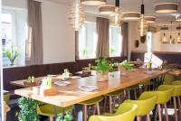 A seating area at Das Grüne Hotel zur Post - 100 % BIO