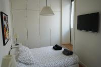 Postel nebo postele na pokoji v ubytování Marquês Modern Art apartment