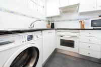 A kitchen or kitchenette at ATICO MIJAS COSTA