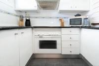 A kitchen or kitchenette at ATICO MIJAS COSTA