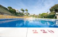 The swimming pool at or close to ATICO MIJAS COSTA