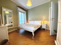 A bed or beds in a room at Vittoria Suite Milano