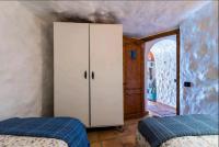 Postel nebo postele na pokoji v ubytování Silence's Cave Rural House