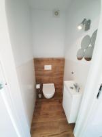 Kúpeľňa v ubytovaní Domek pod świerkami - "Apartamenty świerkowe"