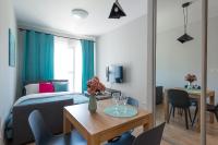 Posteľ alebo postele v izbe v ubytovaní Wagonowa P&O Apartments