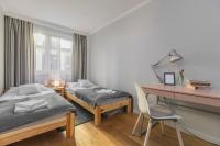Posteľ alebo postele v izbe v ubytovaní oompH Wroclaw Old Town Apartment