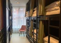 Ein Bett oder Betten in einem Zimmer der Unterkunft Durty Nelly&#39;s Inn