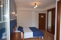 Postel nebo postele na pokoji v ubytování Hotel VIDA Ostra Marina