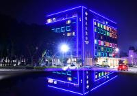 a building with blue lights in a city at night at Tsun Huang Hotel in Chiayi City