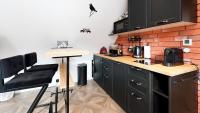 Kuchyňa alebo kuchynka v ubytovaní Apartamenty Sun & Snow Kościelisko Residence