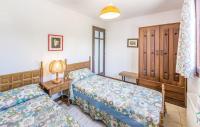 Postel nebo postele na pokoji v ubytování InmoBooking Family House Holidays