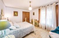 Postel nebo postele na pokoji v ubytování InmoBooking Family House Holidays