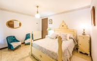 Postel nebo postele na pokoji v ubytování InmoBooking Family House Holidays