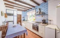 Kuchyň nebo kuchyňský kout v ubytování InmoBooking Family House Holidays
