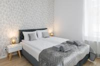 Posteľ alebo postele v izbe v ubytovaní NOOK NOOK Apartments Katarzyny 2