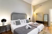 Posteľ alebo postele v izbe v ubytovaní Apartamentos Casapalma Centro Histórico